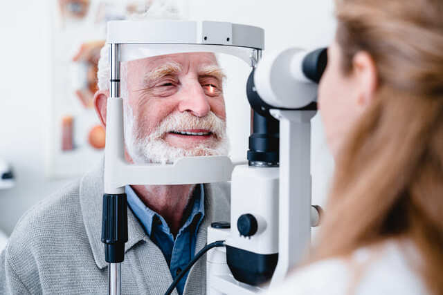 senior man at an eye exam