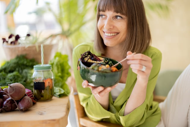 young woman eating healthy food